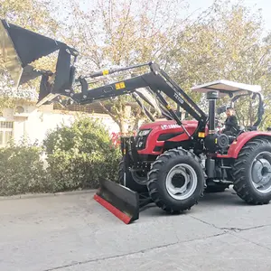 Phía trước bộ nạp và backhoe digger máy kéo