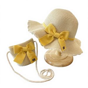 Venta al por Mayor de Sombreros de Paja para Niños Unisex con Protección Solar para el Verano y Juego de <span class=keywords><strong>Mini</strong></span> Bolso con Lazo - Product Image 1