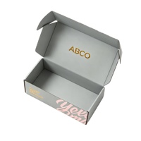 Boîtes d'emballage en papier recyclables de luxe personnalisées auto-érectables imprimées en quadrichromie pour vêtements, boîtes cadeaux et d'expédition avec pelliculage mat