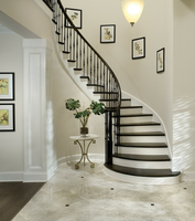 Escalier courbé sophistiqué de style moderne du milieu du siècle pour projets résidentiels haut de gamme