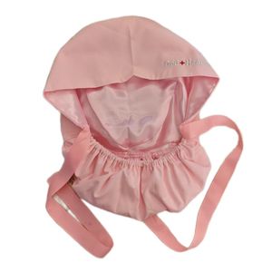 หมวกผ่าตัดผ้าฝ้ายสีพื้นบุด้วยผ้าซาติน ปักโลโก้ตามสั่ง หมวกพยาบาลผู้หญิง สีชมพูสด หมวกสครับแบบรวบผม - Product Image 4