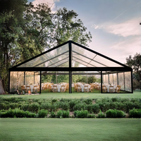 Tente de réception panoramique transparente sur mesure avec structure en aluminium noir pour événements en plein air