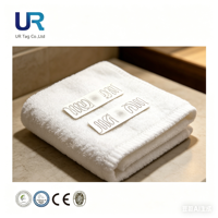 Étiquettes et tags RFID UHF en lin, souples, intelligents, mini, étanches et lavables, 55x12mm, pour la gestion textile en milieu hospitalier/hôtelier (vente en gros)