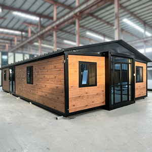 บ้านคอนเทนเนอร์สำเร็จรูปขนาด 30 ฟุต รุ่นโมเดิร์น นิวเจน ดีไซน์สี่เหลี่ยมผืนผ้า โครงเหล็ก ผนังไม้ ติดตั้งง่าย เหมาะสำหรับใช้เป็นสำนักงานหรือพื้นที่อยู่อาศัย - Product Image 2