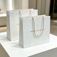 Sac cadeau en papier de luxe personnalisé, sac fourre-tout, papier spécial, impression dorée en relief 3D pour l'emballage de marques de boutiques de détail