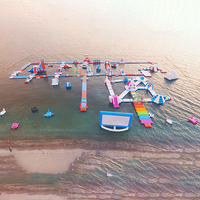Parc aquatique géant gonflable en PVC personnalisé avec logo personnalisé pour les enfants et les adultes utilisation plage d'été