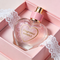 Flacon de parfum élégant en verre givré en forme de cœur avec accents dorés, logo personnalisé, support OEM ODM