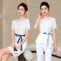 Élégant ensemble de robe uniforme SPA respirant mélange de poly-spandex conception de couture de princesse pour les cosmétologues féminines