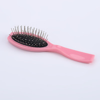 Nouvelle brosse à cheveux coussinée 2026 avec logo personnalisé pour perruques, accessoires de coiffure, peigne à poils métalliques et manche en plastique pour perruques