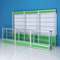 Vitrine de pharmacie moderne en aluminium argenté sur mesure avec porte verrouillable en verre, éclairage LED et design écologique