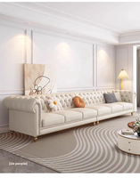 Canapé en cuir véritable de style français, trois places, en forme de L, couleur crème, pieds en bois massif, détails zippés, luxe léger, salon