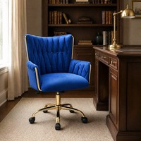 Fauteuil lounge en velours avec dossier capitonné, assise rembourrée, accoudoirs incurvés et base à cinq étoiles pour salon et chambre