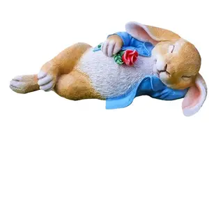 樹脂工芸品眠っているウサギの彫像屋外の庭の装飾ウサギの家の装飾の彫像と彫刻