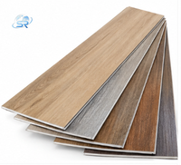 Revêtement de sol SPC étanche à clipser, résistant aux hautes températures, en composite pierre-plastique pour la décoration commerciale, hôtelière et d'ingénierie