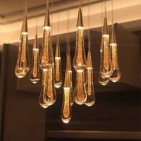 Vente en gros de lustre en verre cristal personnalisé pour décoration intérieure moderne et légère villa de luxe escalier hall d'hôtel