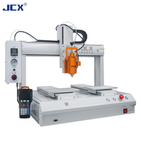 Machine de distribution entièrement automatique à double tête et deux stations pour seringues de colle époxy, UV et thermofusible avec fonction de revêtement et de goutte-à-goutte