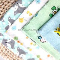Schlussverkauf china textilien lagerware 100 % baumwolle cartoon gedruckte flanellstoffe in rollen günstiger preis