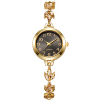 Vente en gros de montre-bracelet coulissante pour étudiante en alliage simple et mode avec fleur en diamant et feuille Cadeau pour femme fille