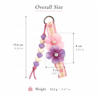 Porte-clés trèfle à quatre feuilles artificiel mignon avec pompon, breloque florale bohème pour sac, cadeau pour femmes et filles, accessoire
