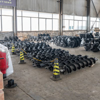 Foreuse hélicoïdale pour excavatrice : Perçage rapide de fondations de pieux et de trous pour barrières de sécurité routières