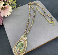 Nouvel ensemble de bijoux en coquille d'ormeau naturelle incrustée de pierre brute de tourmaline, style chinois populaire et vintage