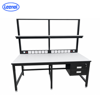 Banc de travail fixe noir ESD Leenol Industrial avec tiroirs pour inspection et réparation de circuits imprimés
