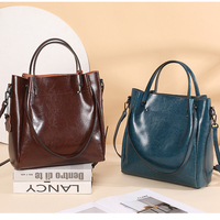 Sac seau en cuir véritable de luxe, conçu par Custom Handbag pour femmes, vente en gros