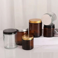 Bocaux à bougies esthétiques en verre ambré vides avec couvercles à vis noirs et boîtes cadeaux en kraft à vendre