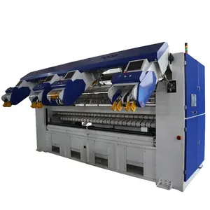 Automatic ironing and folding machine for commercial laundry machines