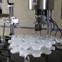 Machine de capsulage rotative entièrement automatique à tête unique |   Capsuleuse en aluminium pour bouteilles de spiritueux et d'huiles essentielles en verre