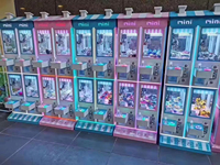 Machine de jeu d'arcade à grue pour mini-poupées et jouets, à vendre