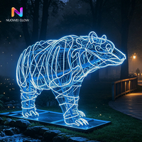 Sculpture lumineuse 3D en fer NUOWEI GLOW en forme d'ours polaire pour des scènes nocturnes époustouflantes, zoos, jardins botaniques, parcs à thème. pour la décoration