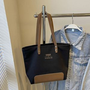 Sac à bandoulière en toile minimaliste avec poignées robustes, couleur personnalisable pour les voyages quotidiens et le shopping - Product Image 1