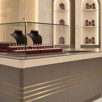 Vitrine de présentation de bijoux en acier inoxydable de luxe, éclairage LED haute transparence, dimensions personnalisables, design durable et écologique