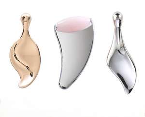 A forma di delfino in lega di zinco Gua Sha strumento di raschiatura per il corpo e il viso meridiano massaggio massaggiatore viso a doppio uso - Product Image 1