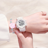 Montre numérique pastel mignonne pour adolescents, montre-bracelet électronique de sport transparente avec bracelet perlé pour un usage quotidien