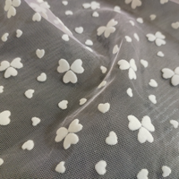 Tissu en tulle floqué 100 % polyester respirant pour vêtements féminins, textiles de maison, maille tricotée élégante, durable et légère