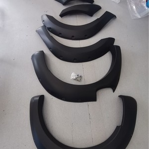 Protector de Guardabarros para T7, Acabado Mate PP, Kit de Carrocería con Cinta Adhesiva o Tornillos para Instalación - Product Image 1