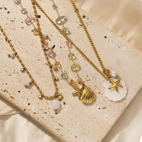 18K chapado en oro de acero inoxidable verano playa joyería moda océano serie colgante estrella de mar Shell perla grava clásico para niñas