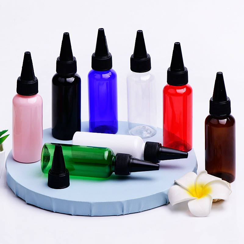 ขวดสีเหลืองอำพันพร้อมฝาบิดสีดำ