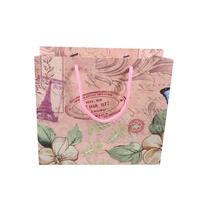 Personnalisez le grand sac cadeau à provisions en papier rose pour vêtements avec poignée pour votre propre logo