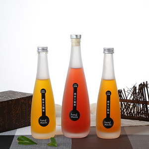 Sake-contenedor de licor redondo para cóctel de ron, botella de cristal vacía de 330ml y 500ml con logotipo personalizado, venta al por mayor - Product Image 1