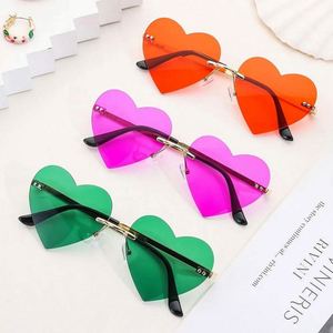 Gafas de Sol de Moda 2023 al por Mayor para Mujer, sin Montura, con Forma de Corazón, UV400, Metálicas, Estilo Punk - Product Image 1