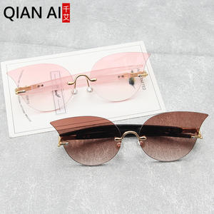 Lunettes de soleil œil de chat Qianai pour femme, verres jaunes océan, protection UV 100%, design irrégulier tendance pour la protection solaire et les voyages - Product Image 3