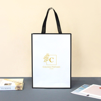 Sacs de courses en carton recyclable de luxe personnalisés de haute qualité avec poignées longues imprimées pour chaussures et chaussettes – Vente en gros