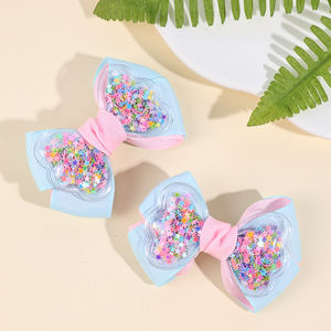 CN ริบบิ้นผ้ากรอสเกรน2ชิ้นโบว์ติดผมสีพาส<span class=keywords><strong>เท</strong></span><span class=keywords><strong>ล</strong></span>โบว์สีทึบพร้อมกลิตเตอร์ค<span class=keywords><strong>ล</strong></span>ิปหนีบ<span class=keywords><strong>ผม</strong></span>เด็กผู้หญิง - Product Image 2