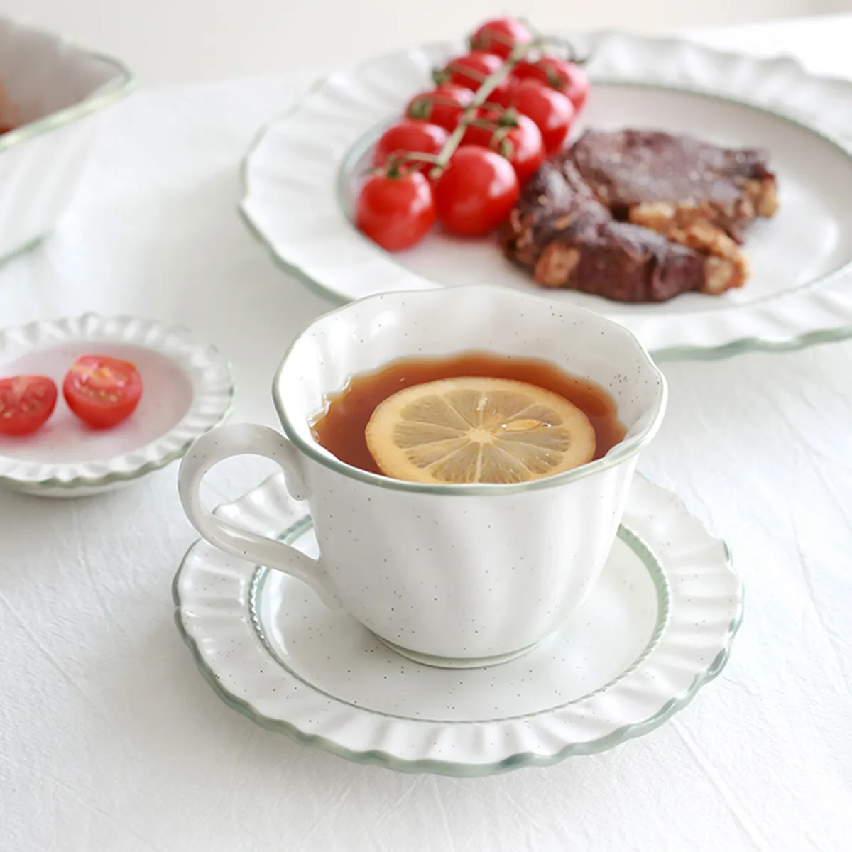 Custom speckle white bulk coffee tea cups and saucers teacups porcelain english tea cup with green rim