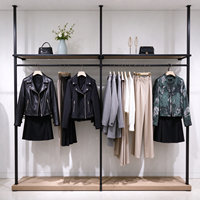 Portant à vêtements noir en métal tubulaire, étagère de présentation multi-niveaux, certifié CE ETL, vente en gros pour boutiques et détaillants