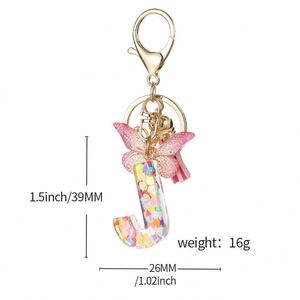 Porte-clés personnalisé avec nom, en résine rose, breloque initiale scintillante en résine à 26 lettres avec pompon papillon, accessoire décoratif pour sacs - Product Image 3