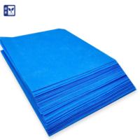 Housse de lit médical jetable non tissée imperméable avec bord élastique pour table d'examen hospitalière